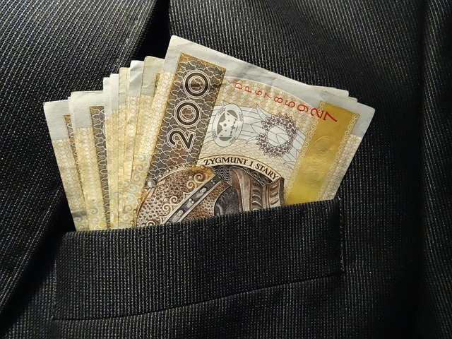 A notebook with tax documents and calculator